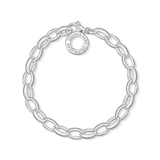 Thomas Sabo classic charm bracelet in polished 925 Sterling silver with a signature logo charm and 0.6 cm wide chain links.