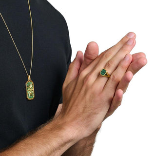 Thomas Sabo gold-plated signet ring featuring a unique green imitation malachite inlay on a polished 925 sterling silver band.