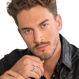 Elegant Thomas Sabo 925 sterling silver love band ring worn by a man, featuring a sleek, rounded design.